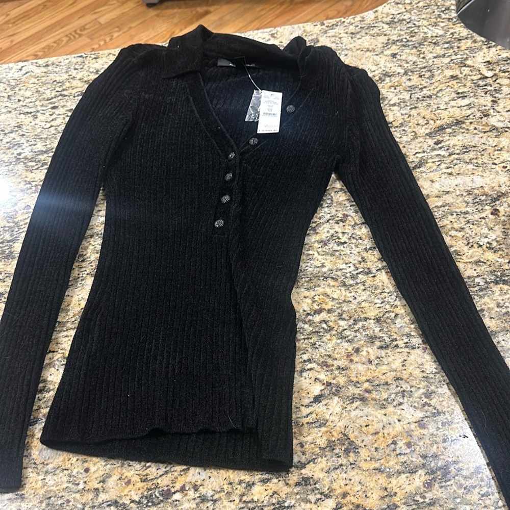 White House black market shirt. Tag still on never worn.